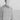 A blurry shot of a man in a button down shirt.