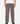 A person standing, wearing the Work Pant in a tobacco twill fabric, displaying a wide leg fit and high rise.