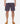 A pair of men's club shorts in a dark color with hand stitching detail around the hem. The shorts have an elastic waist with a drawstring and visible slash front pockets and large rear patch pockets.