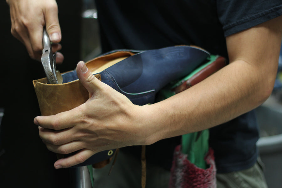 Our boot getting lasted by hand.