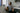 Photo of Carter Asmann sitting in his studio wearing a 3sixteen heavyweight pocket tee.