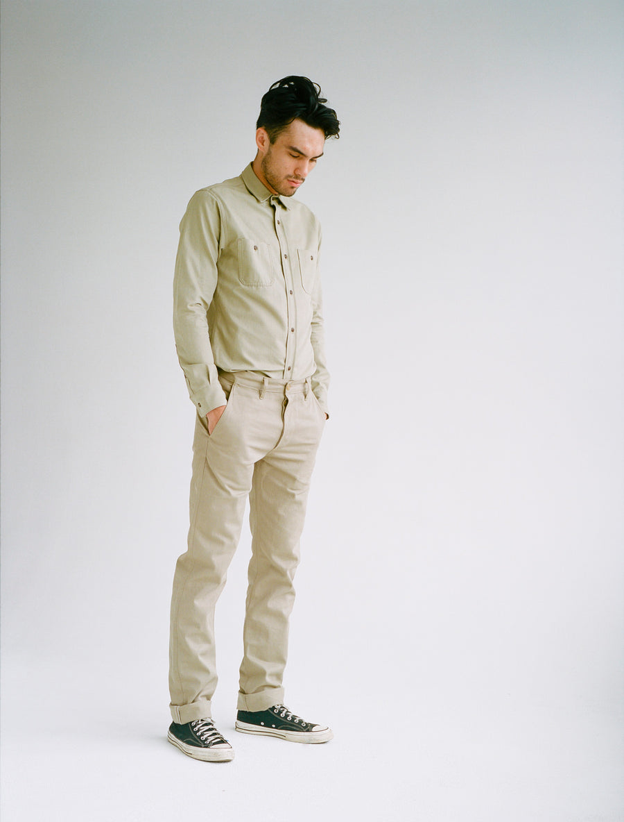 Model wearing tan shirt and tan pants.