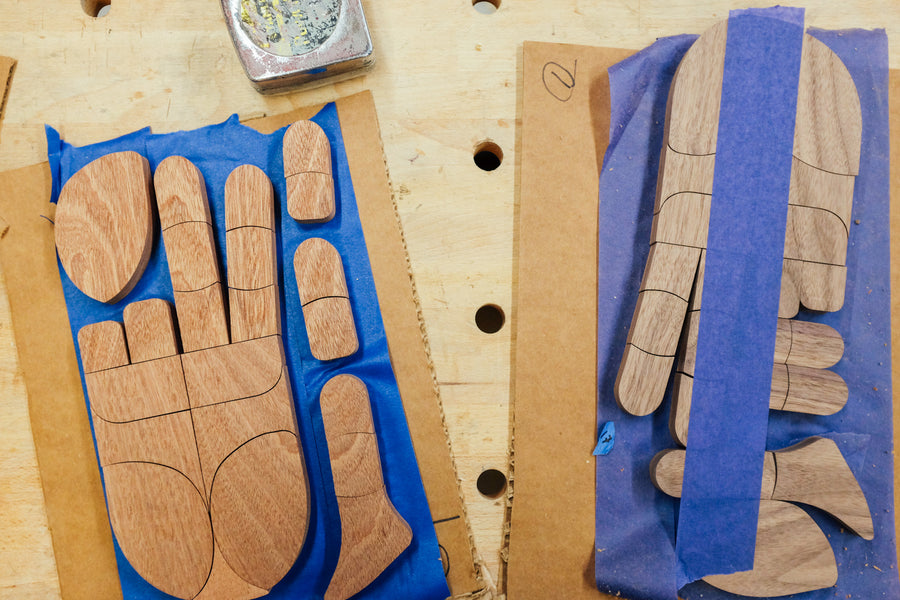 Close up view of wood pieces forming a peace sign.