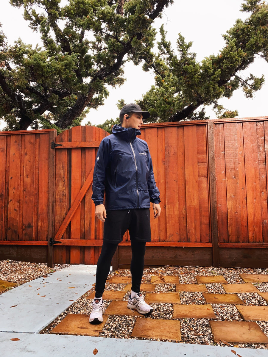 Brandon in a running outfit.