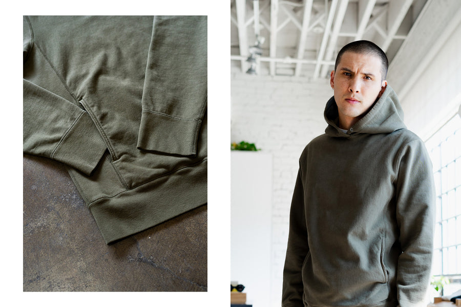 A diptych of our Olive garment dyed hoody on the floor and on model.