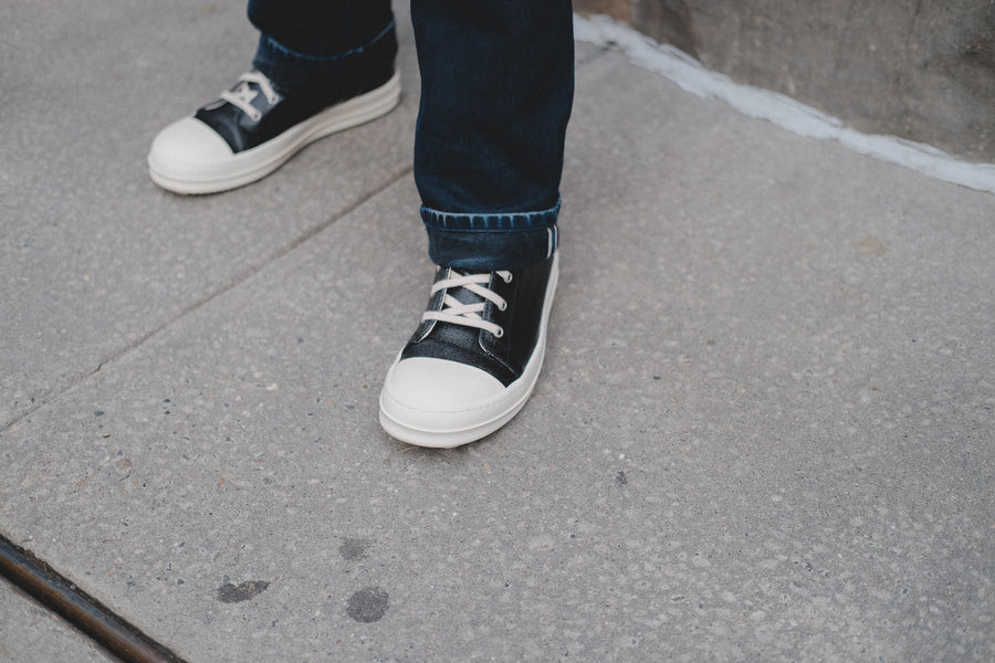 A pair of black Rick Owens Ramones sneakers.