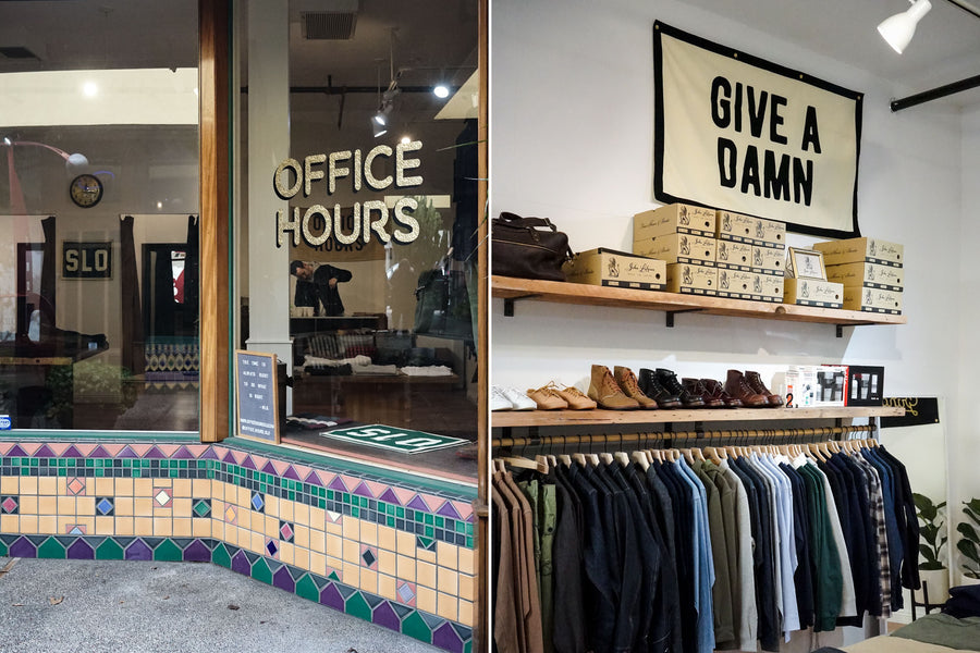 Shirts hang neatly on a bar while boots are displayed on a shelf above.
