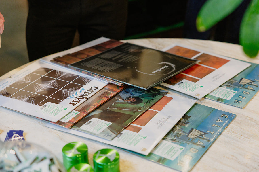 A selection of records on a marble table.