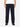 A person standing, wearing the Fatigue Pant in a midnight washed HBT fabric, displaying a straight leg military pant silhouette.