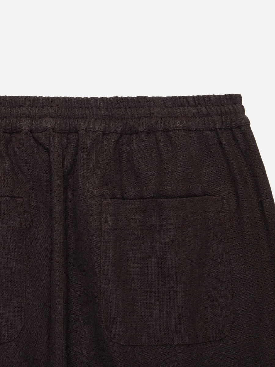 Dark brown shorts with a pocket on a white background