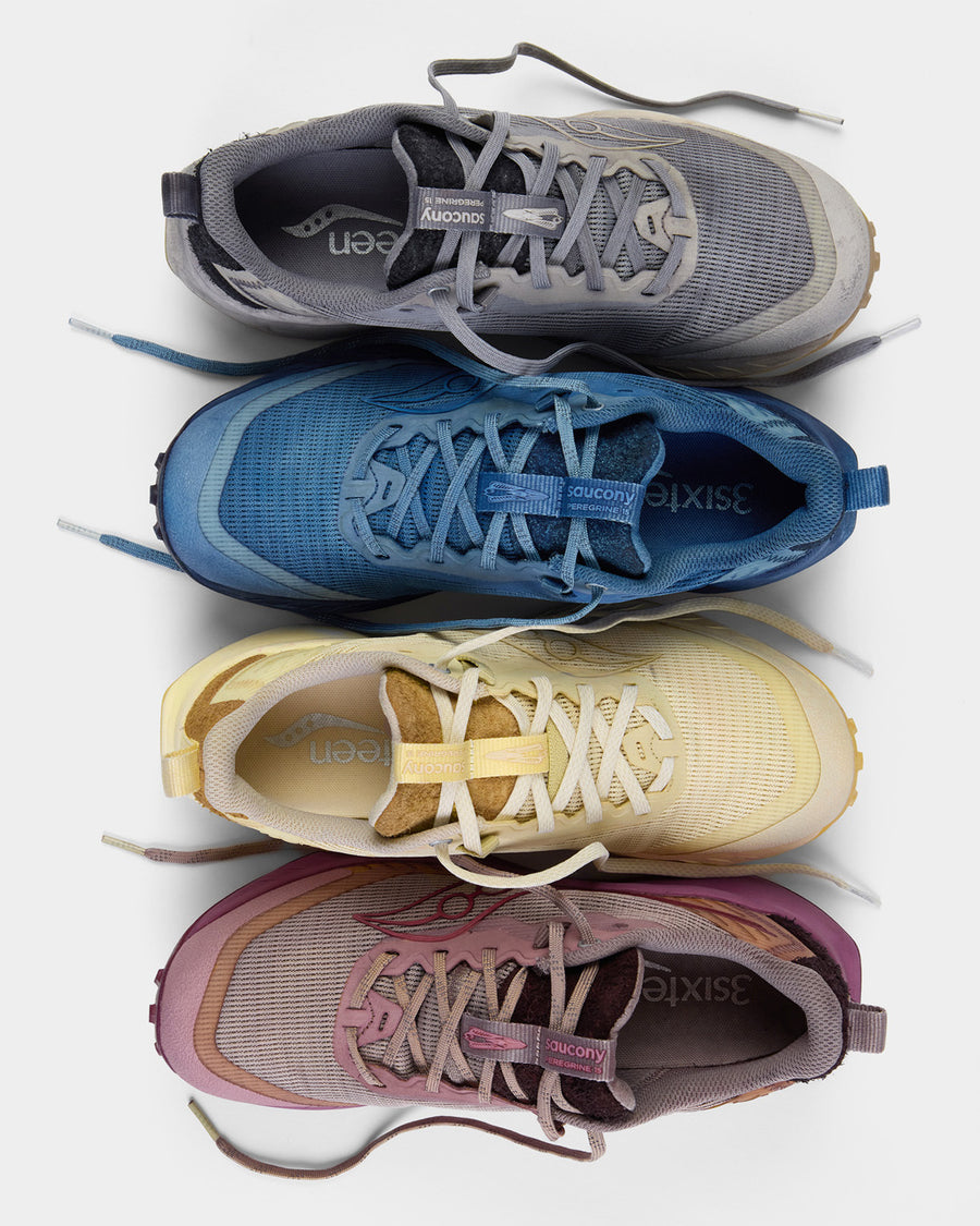 A stack of 4 sneakers dyed different colors