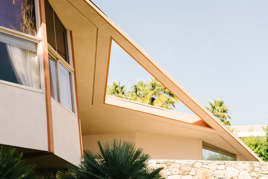 A view of Elvis Presley's home looking up from the ground shows mulitple triangular shapes.