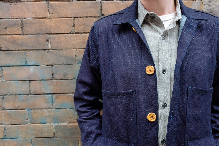 Close up view of front facing details of the sashiko work jacket.