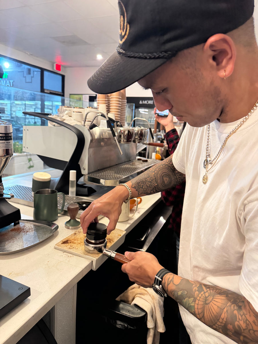 A man making espresso.