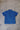 The blue colorway of the shirt has bleached out patterns. 