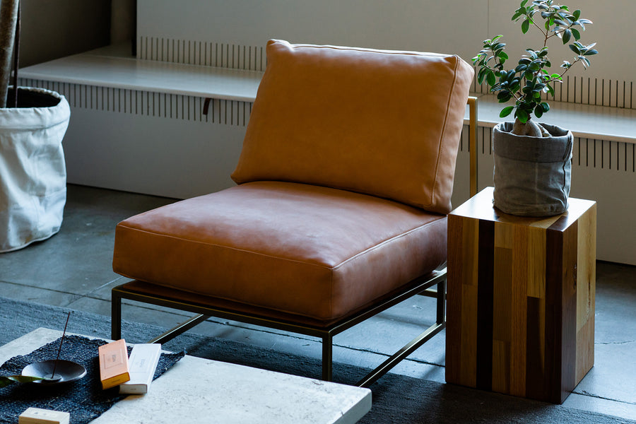 A single chair in vegetable tanned leather