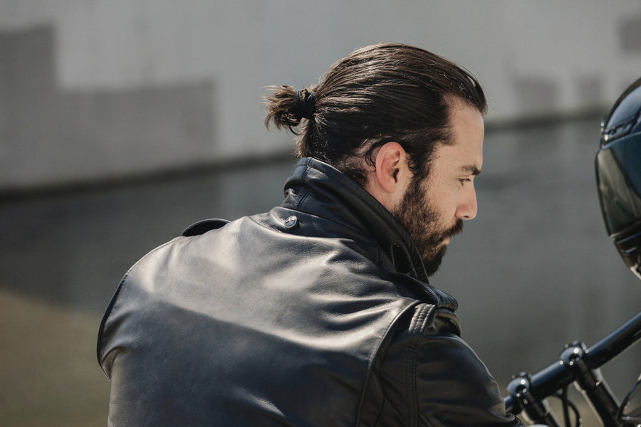 Close of view of sterling silver snap on rear of the Schott.