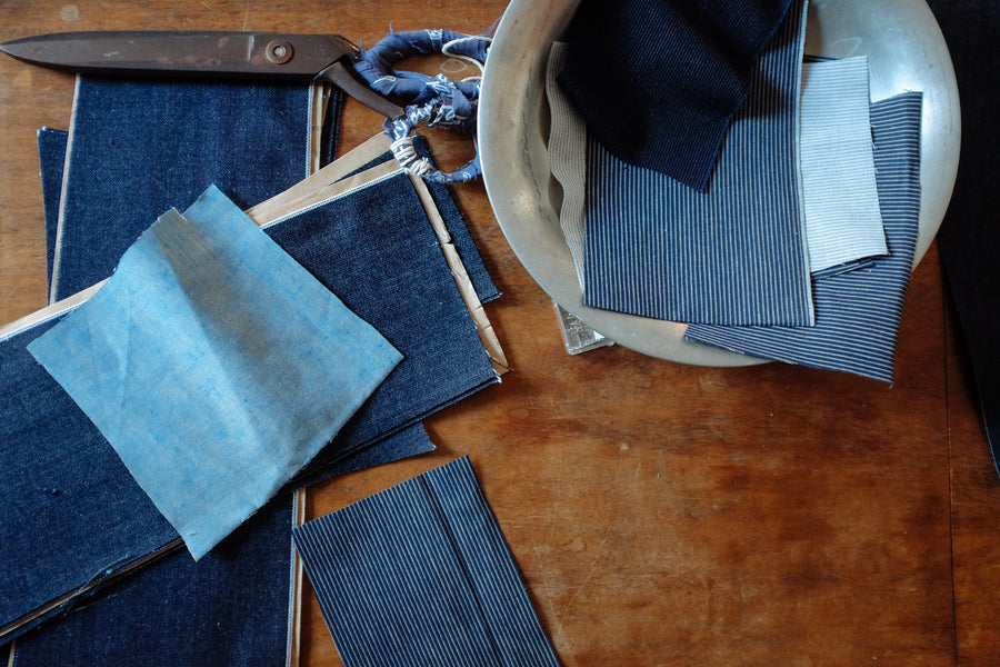 Shown are various fabrics used in the production of the patchwork jacket.