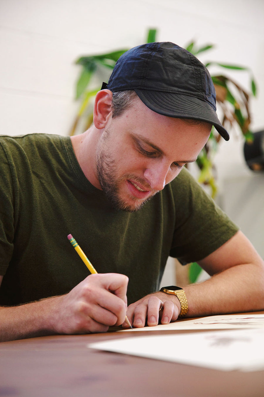 The man is still signing prints.