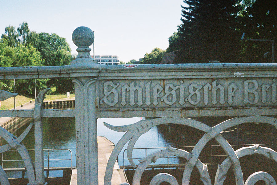 A stone bridge over a small river.