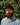 A portrait of a bearded man.