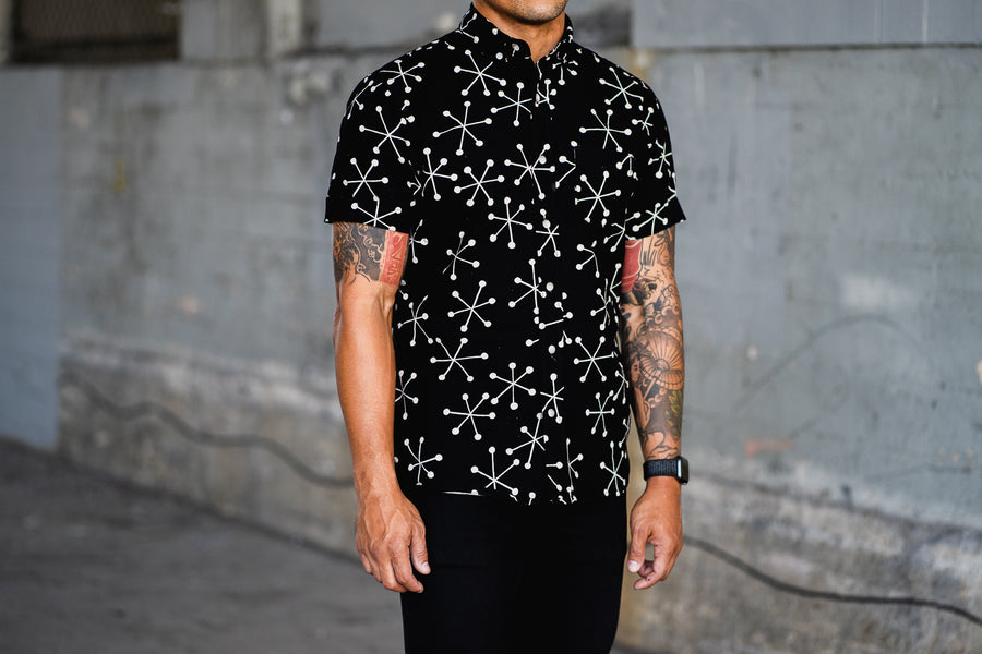 Man stands alone wearing a 3sixteen Jacks shirt