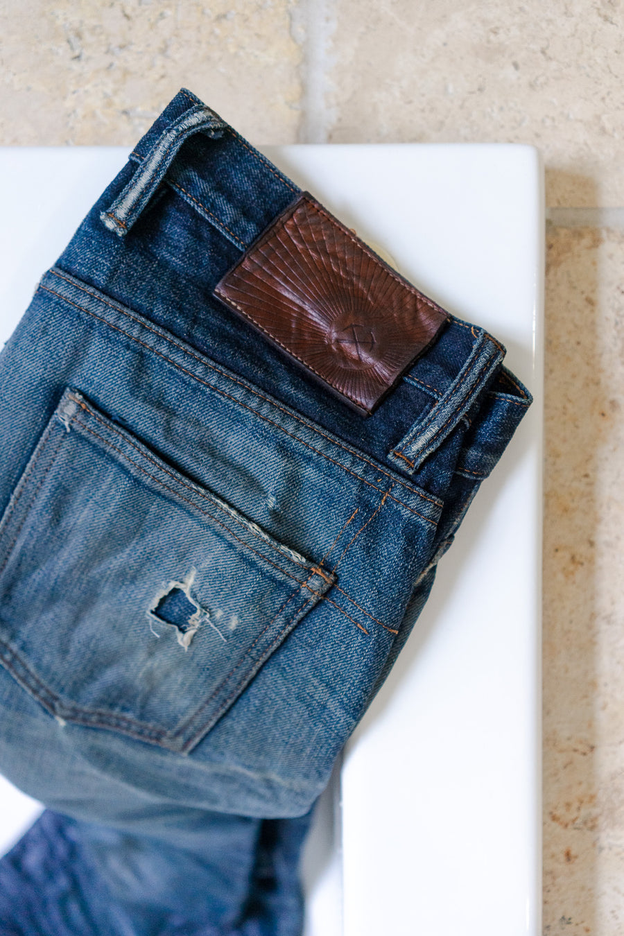 A freshly washed, dry pair of 3sixteen jeans.