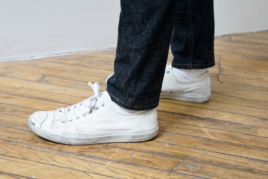 The jean tapers really nicely at the ankle and stacks well onto low-profile footwear.