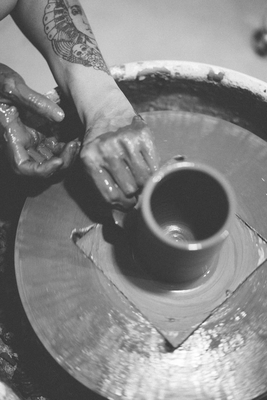 Close up of man molding mug.