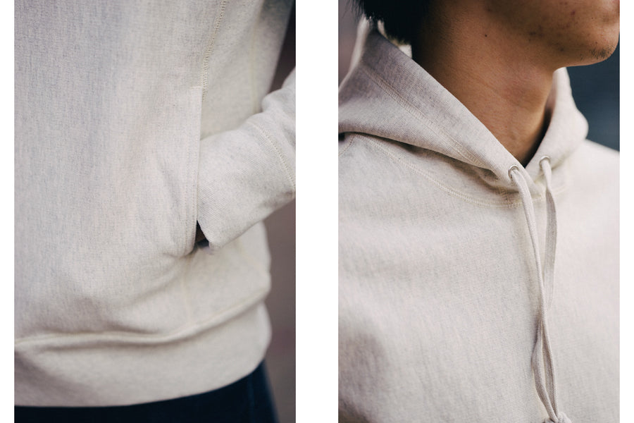 First image highlights our gusset side pockets on an oatmeal pullover, second image is a detailed look at the neck opening with matching pulls
