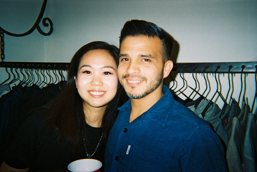 A cute couple smiles for a picture.