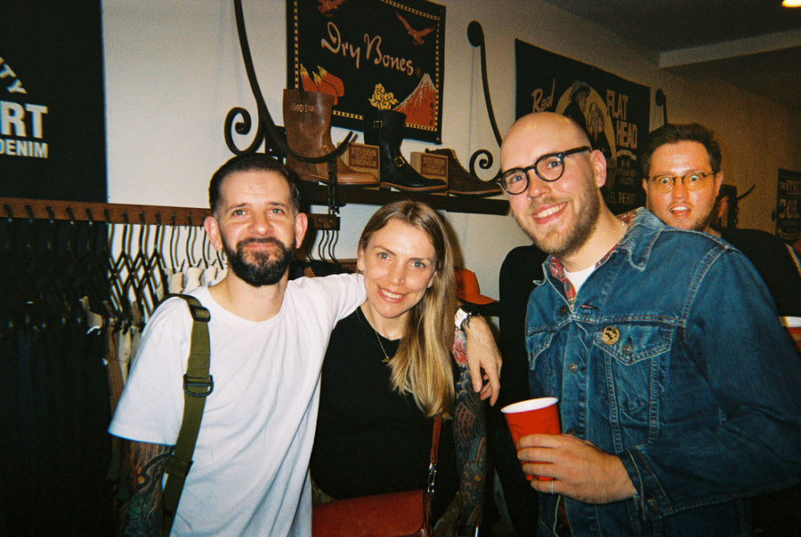 Three friends inside the shop.