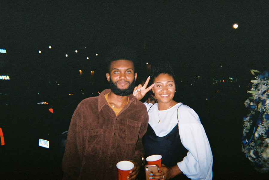 Two friends take a photo together.